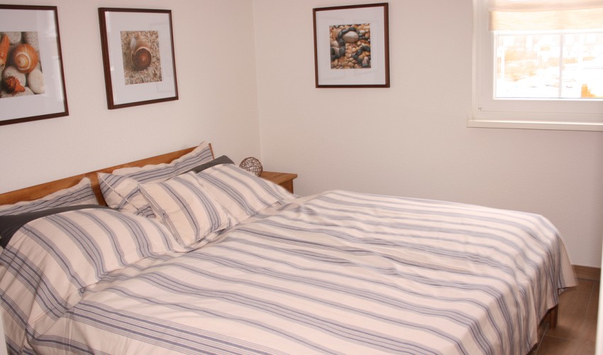 Schlafzimmer mit Doppelbett