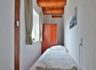 Schlafzimmer 3 mit Einzelbett + Kleiderschrank