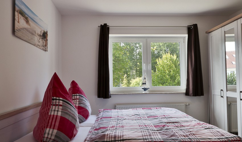 Schlafzimmer mit Doppelbett