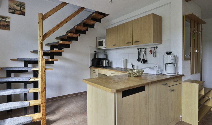 Küche und Treppe ins OG