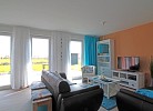 Sitzlandschaft vor den Terrassenfenstern